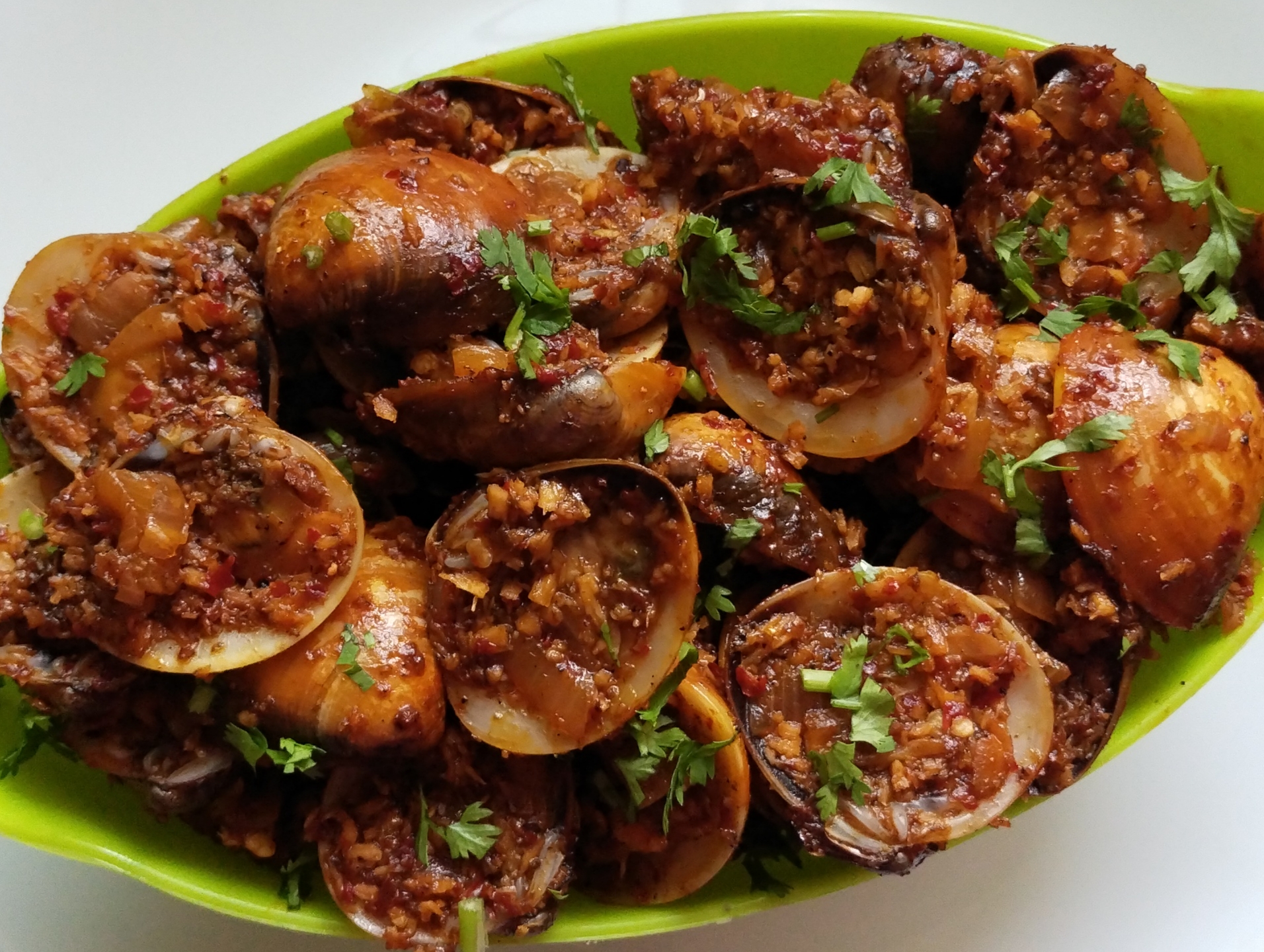 Marvai Sukka, clams tossed dry with onion, garlic and roasted spice