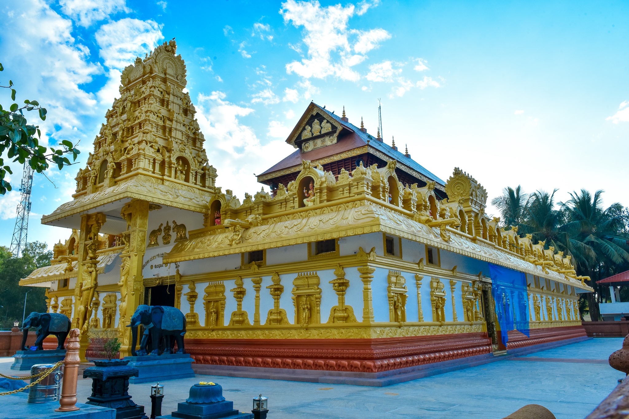The Chandika Durgaparameshwari deity at Kumbhashi with brass face and lamps