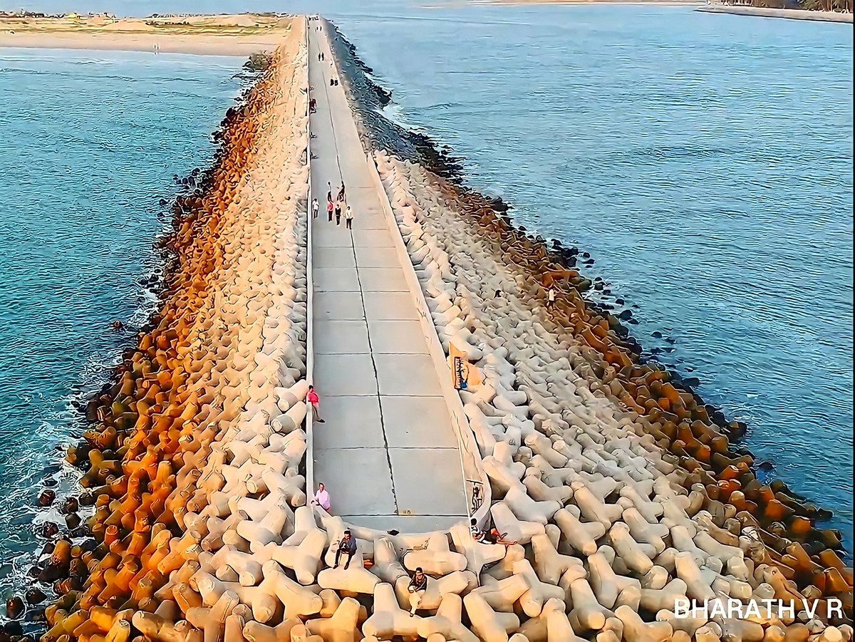 The Gangolli sea-walk breakwater of interlocking tetrapods reaching into the sea